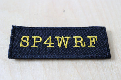 Naszywka z haftowanym Znakiem Wywoławczym - Czarna naszywka z rzepem (100 x 35 mm)