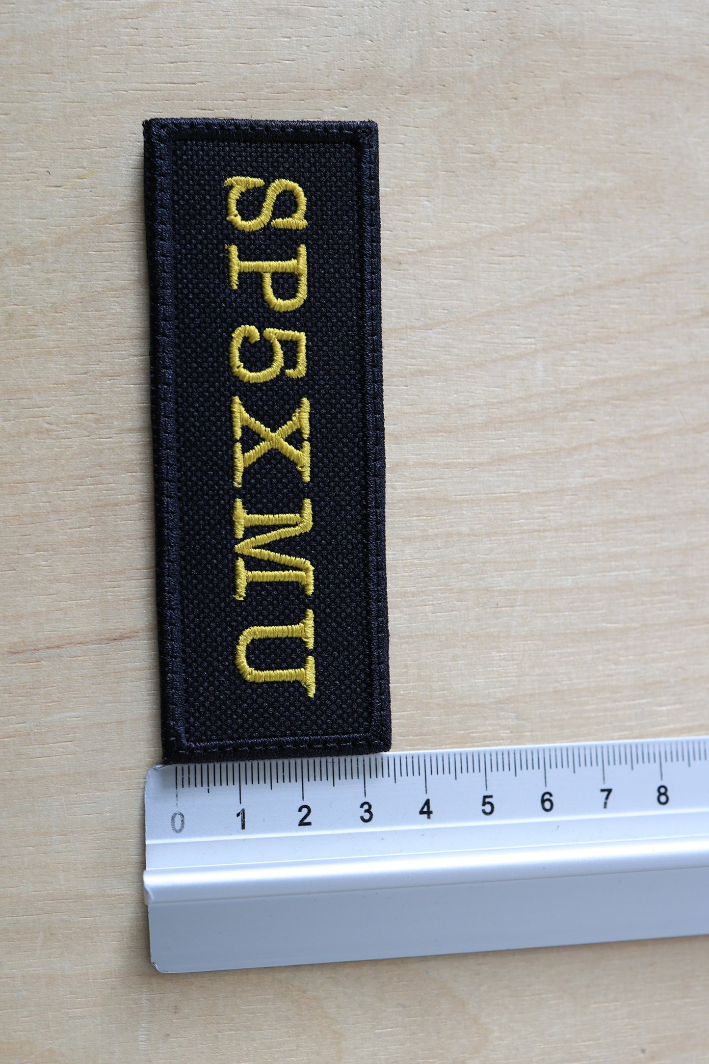 Naszywka z haftowanym Znakiem Wywoławczym - Czarna naszywka z rzepem (100 x 35 mm)